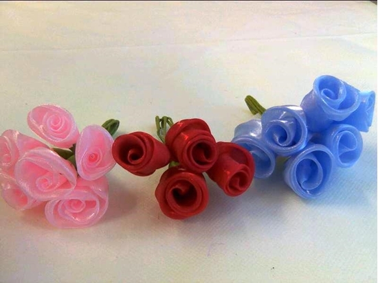 Immagine di ROSA ORGANZA ARROTOLATA CF. 36 PZ.