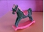 Picture of CAVALLO DONDOLO RES. VERDE H. 8 CM.