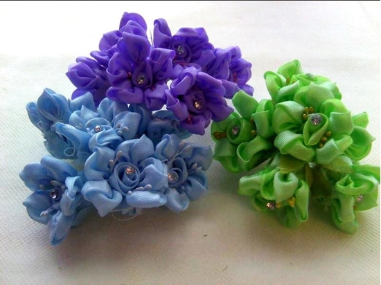 Immagine di FIORE ORG. CON BRILLANTE CF. 72 PZ.